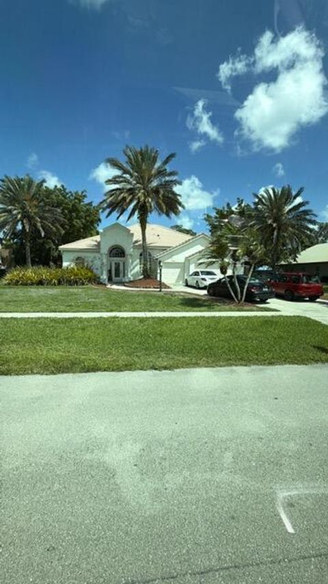 Photo of 4447 Hunting Trail, Lake Worth, FL 33467 (MLS # B26037539)