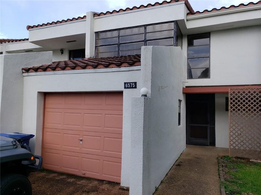 Cozy corner 3 bed/2.5 bath townhouse in desirable gated community; with water views from master bedroom upstairs and from living room and patio downstairs. Tile and laminated floors throughout, walk-in closets, updated master bath. New 2 year A/C unit. Garage converted into room, it can be easily re-purposed to original. Conveniently located near 95 and Turnpike, as well as shopping/restaurants/parks and bus line. Great starter home, can rent after first year. Seller VERY motivated, all offers welcome.