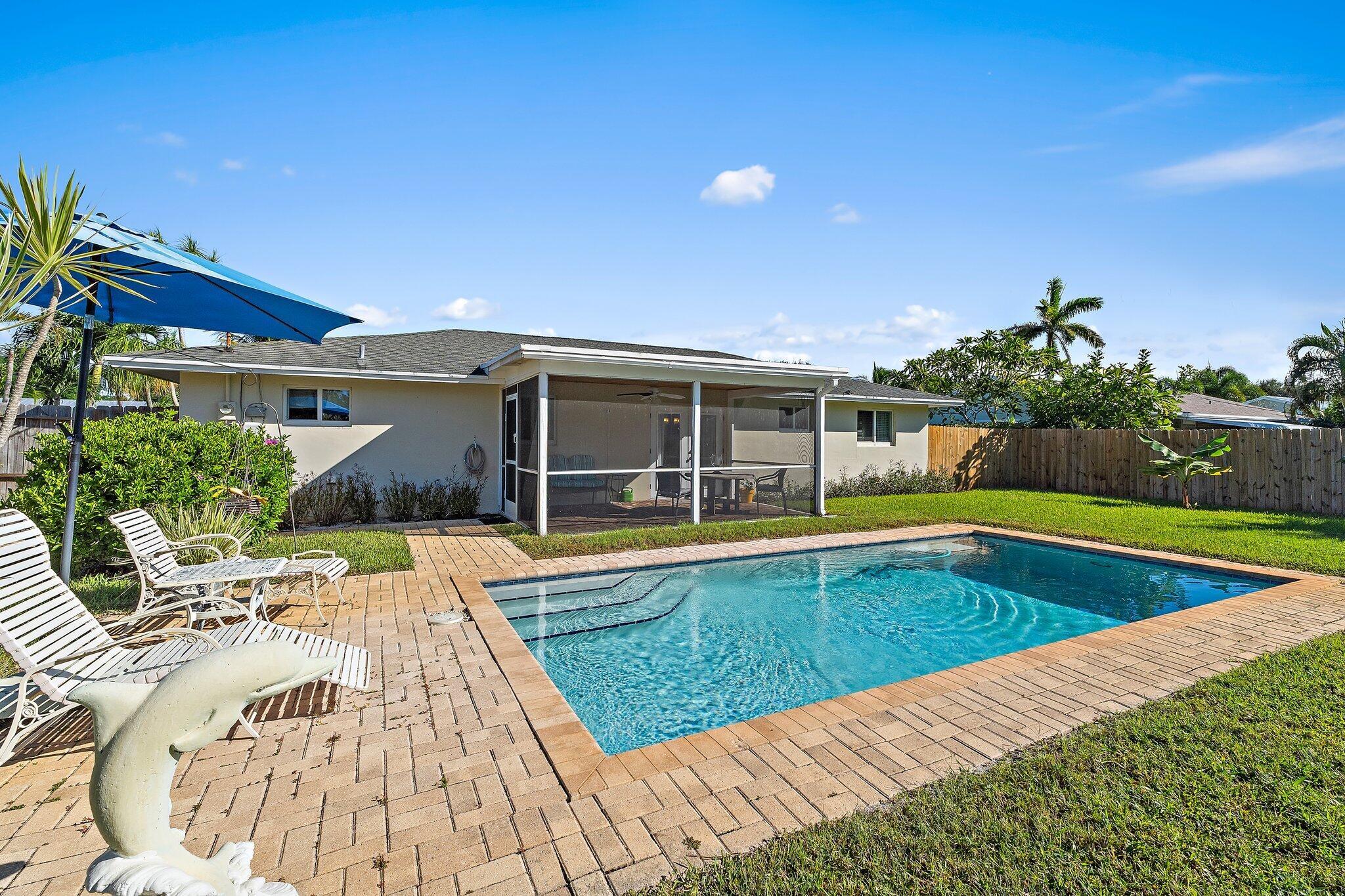 Spend Your Winter in Beautiful TequestaEnjoy your winter season in this quiet and charming Tequesta community. This nicely updated home is situated in one of the most desirable areas in the heart of town--just a short drive to some of the area's best beaches, shops, and restaurants.Relax in your private fenced yard featuring a sparkling saltwater pool, or enjoy your morning coffee in the spacious screened and covered patio. The tastefully furnished 2-bedroom, 2-bath home offers a comfortable, coastal retreat perfect for your Florida getaway.Both bedrooms are extra large and include walk-in closets, providing plenty of space and comfort. If you've been searching for a private beach cottage to unwind and enjoy the Florida lifestyle, you'll find it here in the quaint town of Tequesta