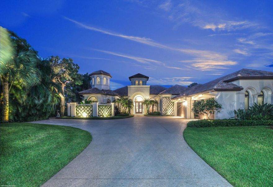 Surround yourself in the Luxurious Florida Lifestyle.  Live steps away from the Intracoastal with a large protected deep water dock for a 75' yacht. There is no need for a vacation, this house has it all. Newly renovated in 2014 Resort style pool & patio, outdoor kitchen, gazebo and wet bar. Lavish master suite w/his/her closets,laundry room, breakfast bar,separate sitting room, large master bath. Open family room-kitchen floor plan lets you entertain while in the new gourmet kitchen w/ new countertops, Thermador range, island food prep station and much more. Watch all of your favorite shows in the comfort of the 8 person theater, conveniently located off the family room.New entire house generator, outdoor grill,driveway and much more. YOU CAN STOP LOOKING...THIS HOUSE HAS IT ALL AND MORE!