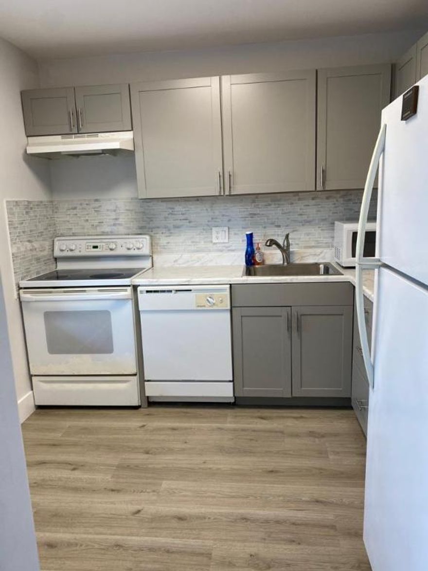 Lovely 2/2 Condo in 55+ community. Located in Fabulous Delray Beach. Two bedroom Suites. formal dining area plus eat in kitchen. Lovely laminate wood floors in the latest gray tones so popular today, New Dining area lighting. paddle fans.