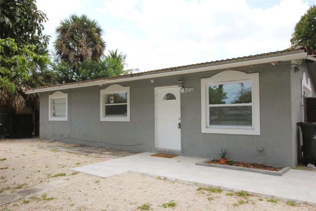 Photo of 1545 NW 15th Ter, Fort Lauderdale, FL 33311 (MLS # F10490443)