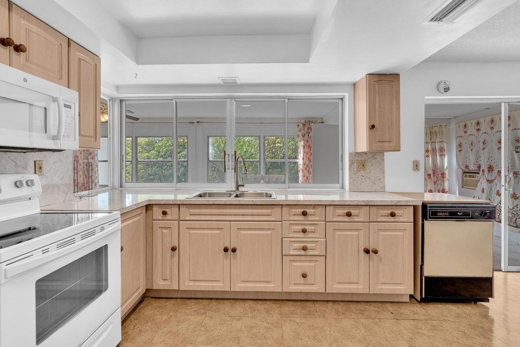 Photo of 2445 NW 72nd Avenue, Sunrise, FL 33313 (MLS # B26011953)