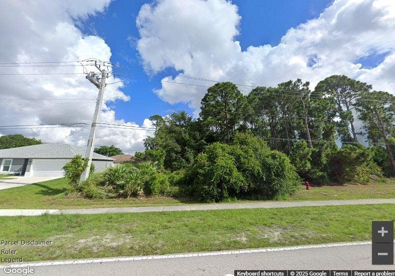 Photo of 807 SW California Boulevard, Port Saint Lucie, FL 34953 (MLS # F10482012)