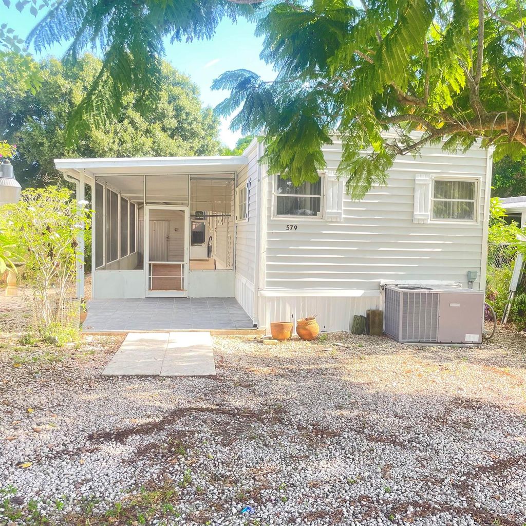 Photo of 579 SE Seville Street, Stuart, FL 34994 (MLS # R11013870)