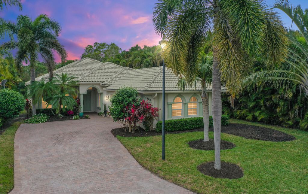 Photo of 4804 NW Red Maple Drive, Jensen Beach, FL 34957 (MLS # R10950541)