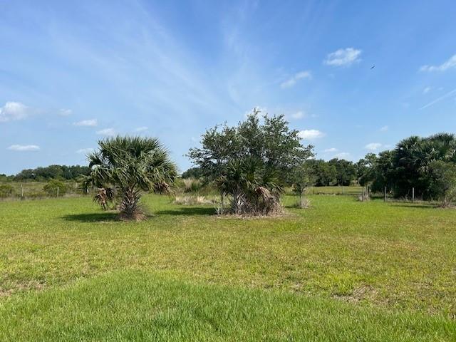 Home ready property! 1.25 acres fully fenced, well with an outdoor shower. Two cement pads to have your RV parked on. Beautiful trees and partially cleared. Zoned residential, hunting and recreational.
Call today!!