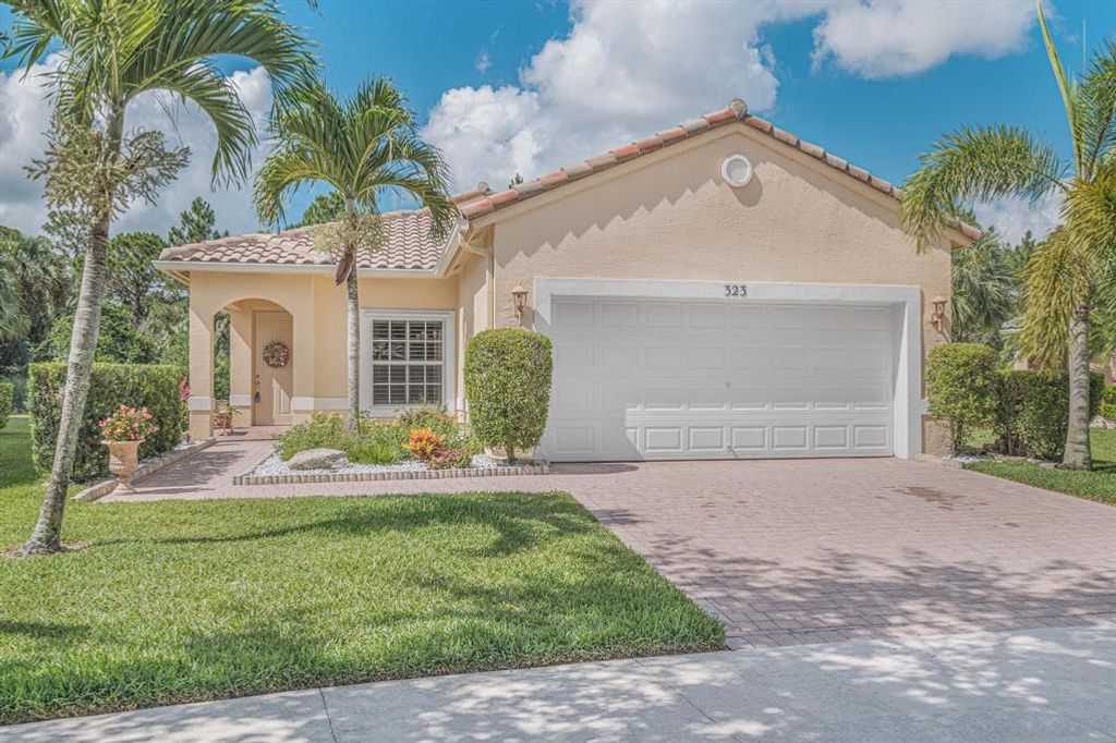 Photo of 323 NW Treeline Trace, Port Saint Lucie, FL 34986 (MLS # R10724680)