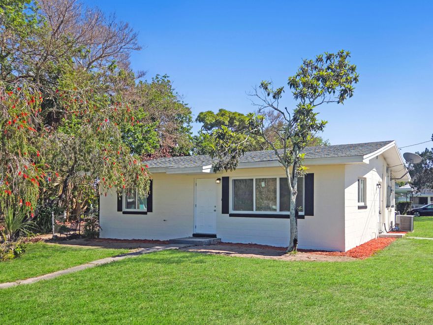 Beautifully renovated home on a large corner lot! No expense was spared in transforming this property into a modern, move in ready home. Upgrades include a 2023 roof, brand new kitchen, bathrooms, AC units, impact windows, lighting, interior and exterior paint, and a tankless water heater. Located in a quiet neighborhood just minutes from downtown and the beaches, this home offers both comfort and convenience. Opportunities like this don't come often — act fast!