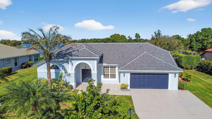 Completely remodeled home on a stunning lakeside half acre lot at Legend Lakes Estates in Lake Worth, a singular development moments from all that Wellington Florida has to offer..  Move in condition with newer 2024 roof and 2024 installed impact rated windows  Recently resurfaced diamond bright pool with 2024 installed full screen enclosure 
The home features bright white kitchen cabinets, newer stainless steel dishwasher, range,,  newly installed stainless steel refrigerator & microwave.  The main living area flooring offers high quality luxury vinyl wood look, plank flooring.  All 3 full baths have been remodeled in a contemporary style. The home has whole house interior painting in November 2025 plus new exterior paint in 2024. See this exceptional property opportunity NOW.