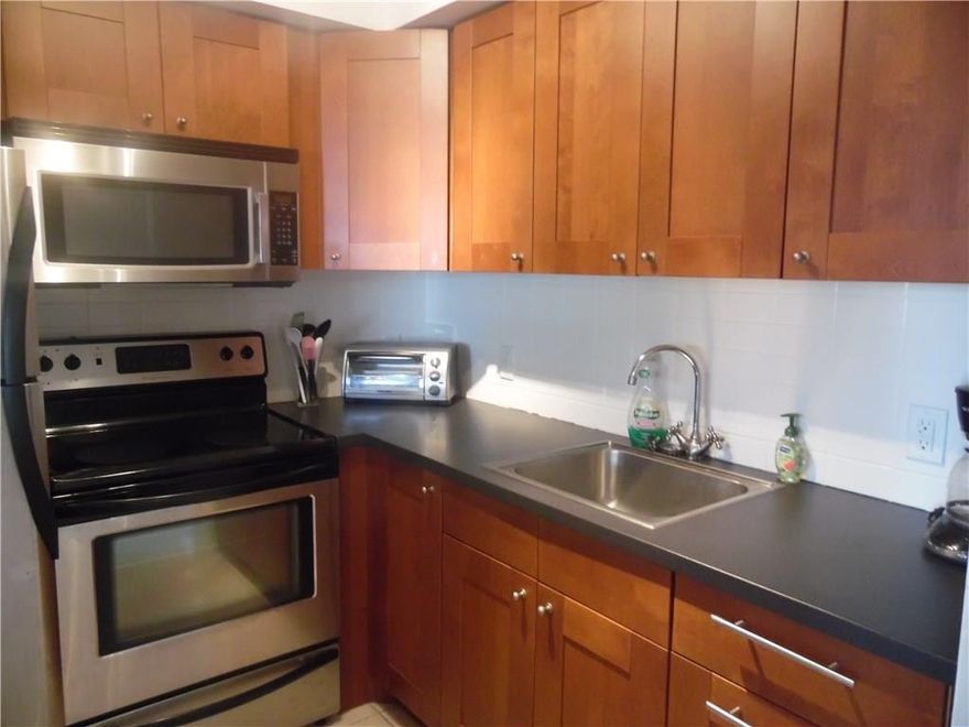 RENTABLE RIGHT AWAY, RENOVATED, SECOND FLOOR W/SCENIC WATERVIEW! NEW KIT CABINETS & COUNTERS, SS APPLIANCES, REMODELED BATHROOM, NEW TILE THRU-OUT, NEW ENCL PATIO W/SLIDING GLASS DOORS. LARGE WALK IN STORAGE CLOSET OFF KITCHEN.  WALK TO POOL!   GATED COMMUNITY, CLOSE TO BEACHES, SHOPPING AND DINING! 24 HR SEC, HEATED POOLS, TENNIS COURTS, FITNESS CTR, SAUNA, SHUTLE BUS, LIVE THEATER, ASSOCIATION CLAIMS 55+