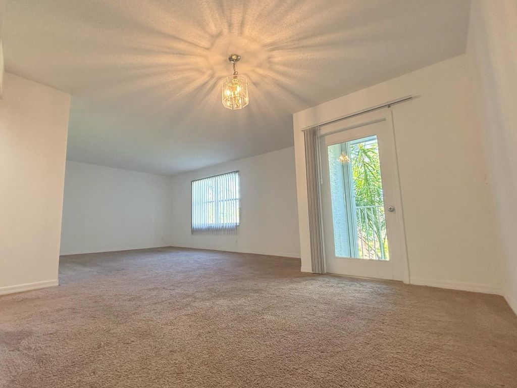 Photo of 9013 NW 38th Drive #102, Coral Springs, FL 33065 (MLS # F10516218)