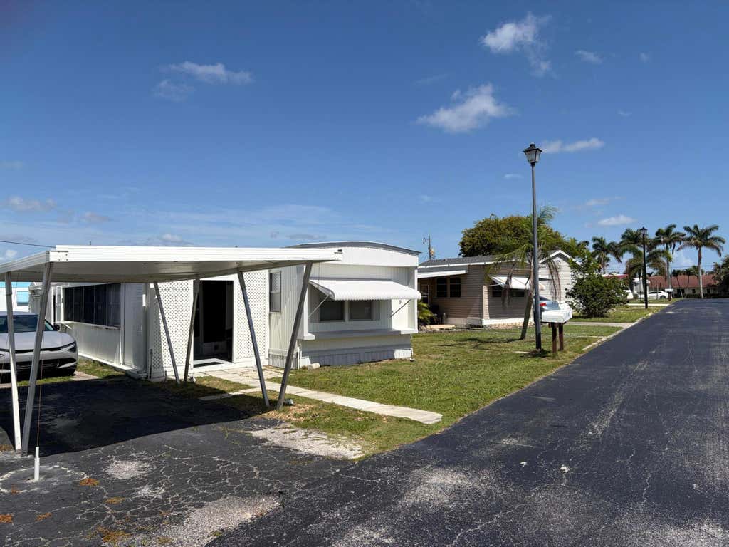Photo of 11055 SE Federal Highway #19, Hobe Sound, FL 33455 (MLS # B26065784)