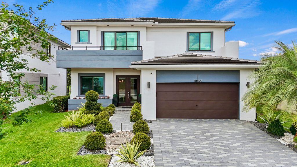 Photo of 10855 Passage Way, Parkland, FL 33076 (MLS # B26029882)