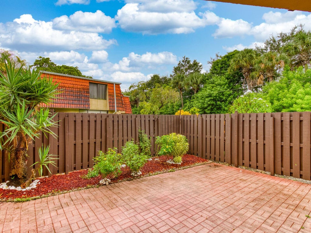 Photo of 23078 Oxford Place #Apt D, Boca Raton, FL 33433 (MLS # B26070952)