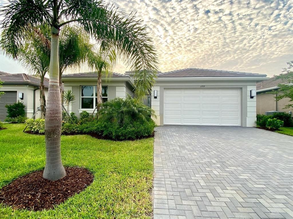 Photo of 11939 SW Wood Stork Way, Port Saint Lucie, FL 34987 (MLS # R10712962)