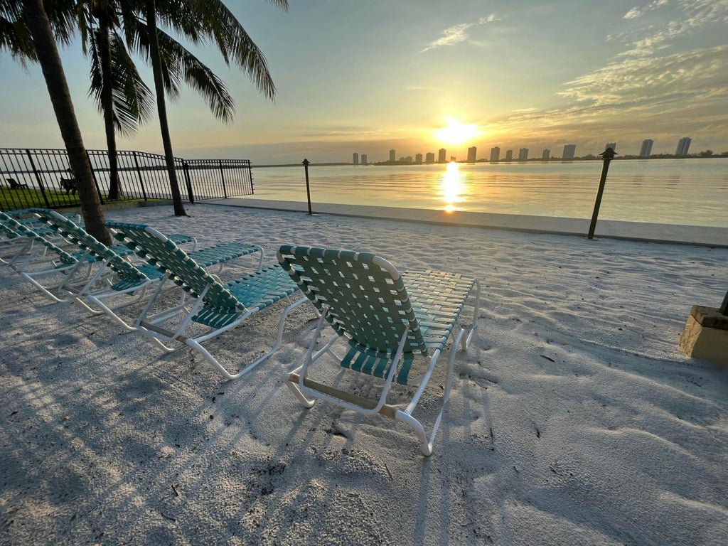 Photo of 1105 Lake Shore Drive #104, Lake Park, FL 33403 (MLS # B26067899)