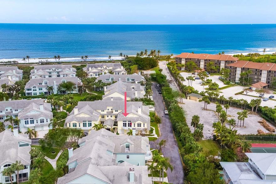 Located in the charming beachfront dog friendly community of Sea Colony, this beautiful two bedroom, two bathroom one car townhome has the feel of a private residence.
Entering through your private gate, a wonderful driftwood and shell garden welcomes you. Once inside, the foyer leads to the open living area which features soaring ceilings and oversized impact windows allowing light and ocean breezes to flow through. The kitchen features all stainless steel appliances. Enjoy the sounds of the ocean from the beautiful open air patio. The guest bedroom on the first floor has a Murphy bed, fold down workspace and an ensuite bathroom. The large master suite upstairs has built in shelves and a large walk in closet. The master bath features a separate shower and tub with dual sinks. Sea Colony is the ultimate in resort living at an affordable price. This 24 hour manned, dog-friendly community with direct ocean access has it all. The large pool area features a covered outdoor entertainment area, covered hot tub, fitness center, tennis courts, walking paths and a private gated walkway to the famous "Jupiter Beach". Sea Colony is conveniently located to restaurants, shopping, and entertainment venues. Palm Beach International Airport is approximately 20 minutes away.