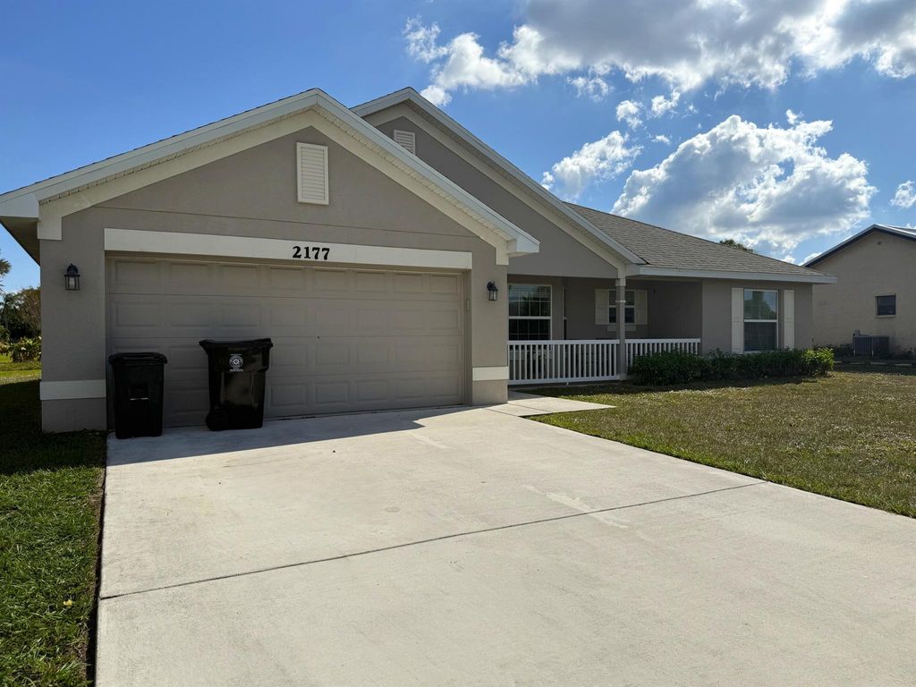 Photo of 2177 SE Dolphin Road, Port Saint Lucie, FL 34952 (MLS # R11142819)