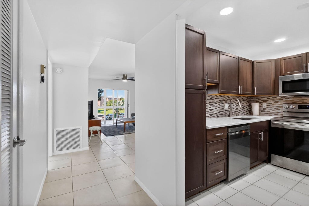 Photo of 2615 NE 1ST Court #201, Boynton Beach, FL 33435 (MLS # B26078734)