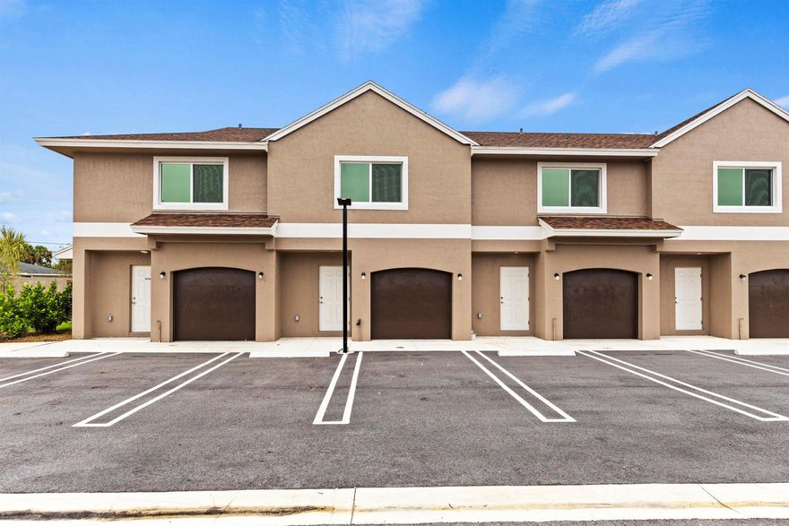 Step into effortless luxury in this beautifully crafted 2-bedroom, 2.5-bath townhome, perfectly located in the heart of Port St. Lucie. With extra windows, more privacy, and stylish finishes throughout, this home offers the ideal blend of comfort and convenience. The open layout features sleek large-format tile downstairs and waterproof laminate upstairs. The gourmet kitchen shines with quartz countertops, stainless steel appliances, and white shaker cabinets. Enjoy a private rear patio, impact windows and doors, upstairs laundry with washer/dryer, a spacious primary suite, garage, and front parking. Move-in ready and designed to impress--schedule your private tour today!