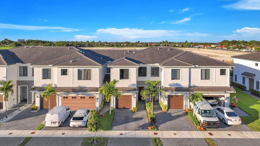 Welcome to The Landings!  This stunning 3 bed, 2.5 bath two-story home, priced at $460,000, is completely move-in ready.  Covering 1,533 sq. ft., this home offers full hurricane impact windows and doors for security throughout along with custom blinds for privacy.  Enjoy low bills thanks to a Google AC thermostat and new LED lighting.  The modern kitchen features granite countertops, and newer stainless steel appliances, including a side-by-side refrigerator.  Enjoy a luxurious Main Bedroom with dual sinks, shower and  walk-in closet.  Flooring includes tile downstairs and vinyl upstairs, plus a second-floor laundry.  Outdoors, find a fenced backyard with an interlocking brick patio.  The HOA covers landscaping, a pool and a dog park.  This home defines low-maintenance modern luxury!