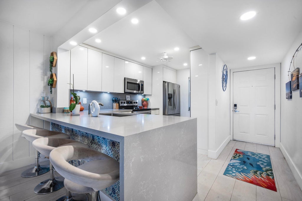 Photo of 4250 N Highway A1a #104, Hutchinson Island, FL 34949 (MLS # R11010655)