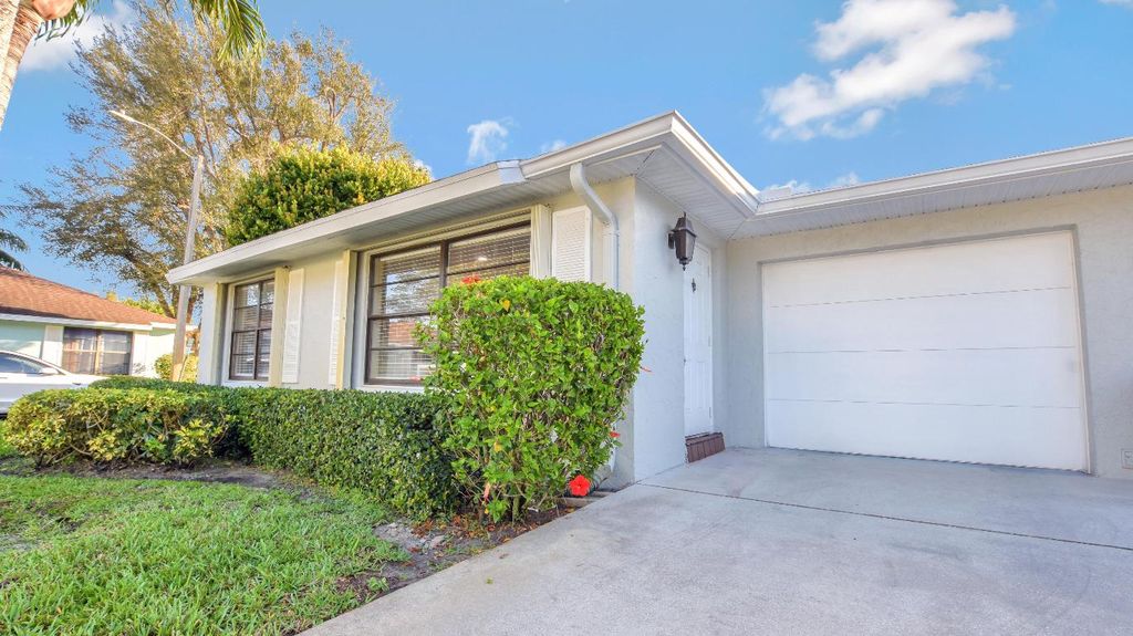 Photo of 9810 Walnut Tree Way #A, Boynton Beach, FL 33436 (MLS # R11063679)