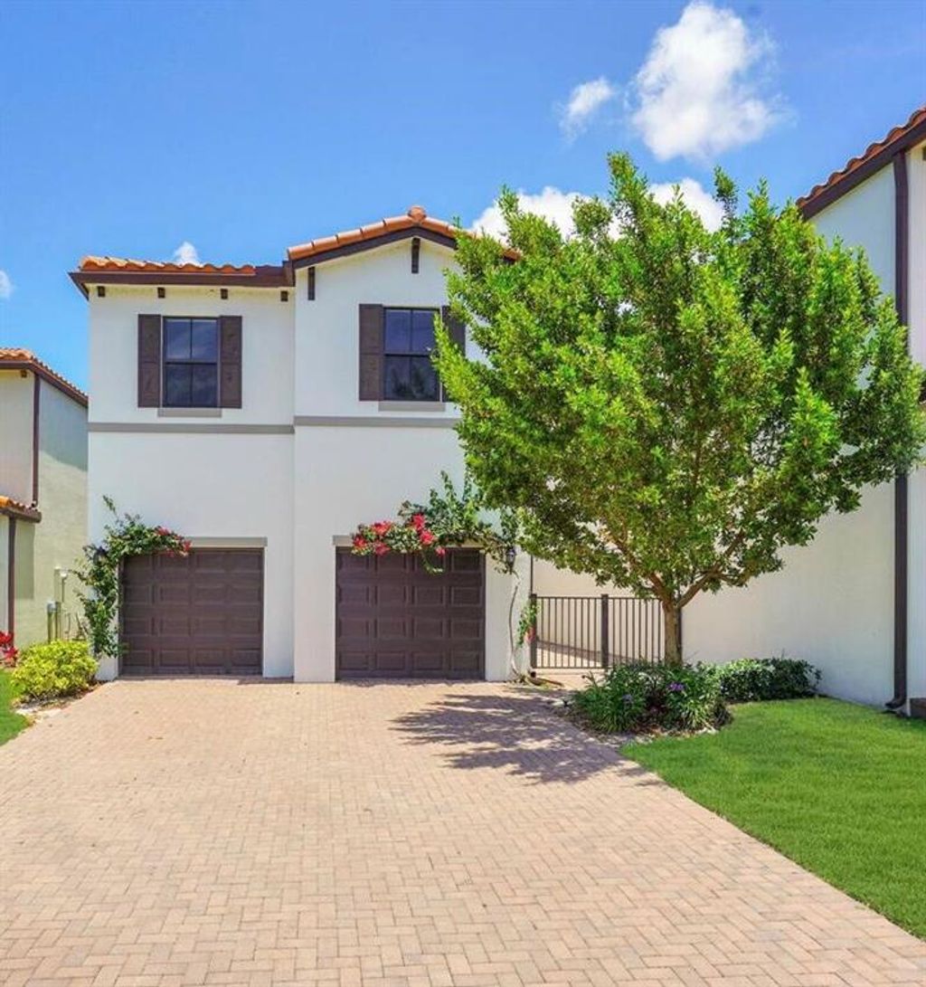 Photo of 3016 Butternut Lane, Riviera Beach, FL 33410 (MLS # R10794772)