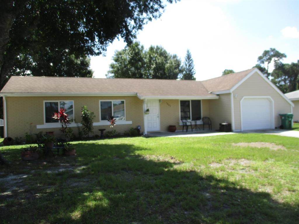 Photo of 1457 SE Buckingham Terrace, Port Saint Lucie, FL 34952 (MLS # R10734874)