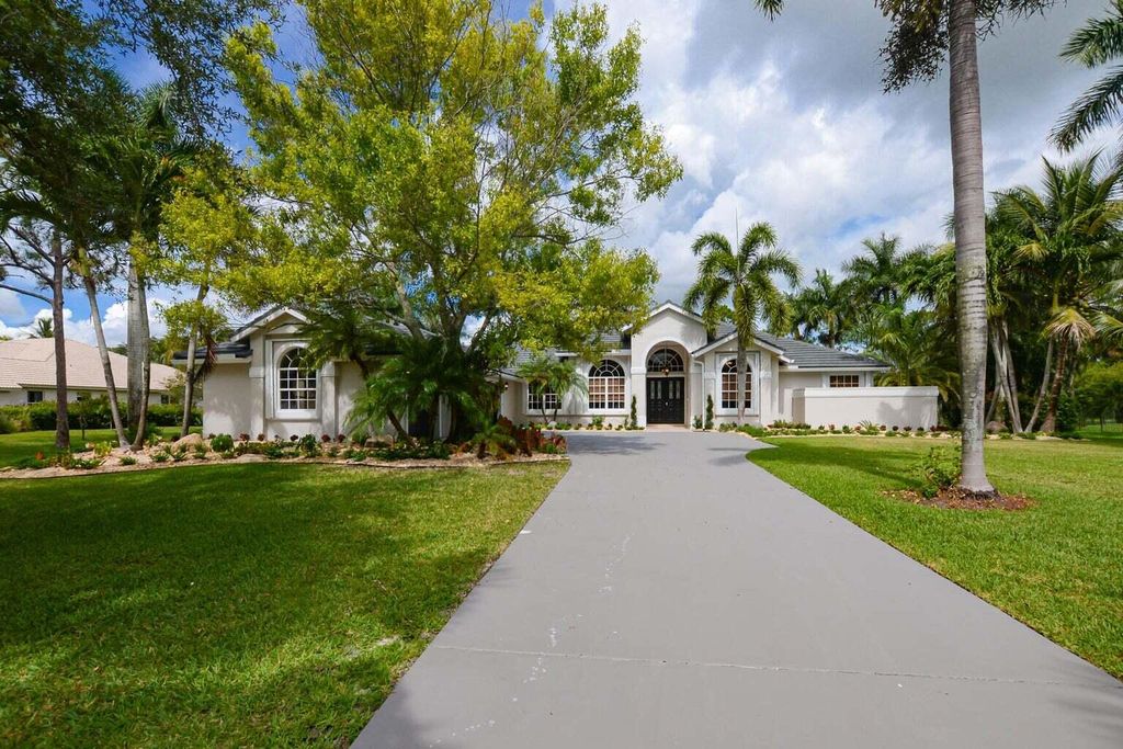 Photo of 7981 Woodsmuir Drive, West Palm Beach, FL 33412 (MLS # R11031711)