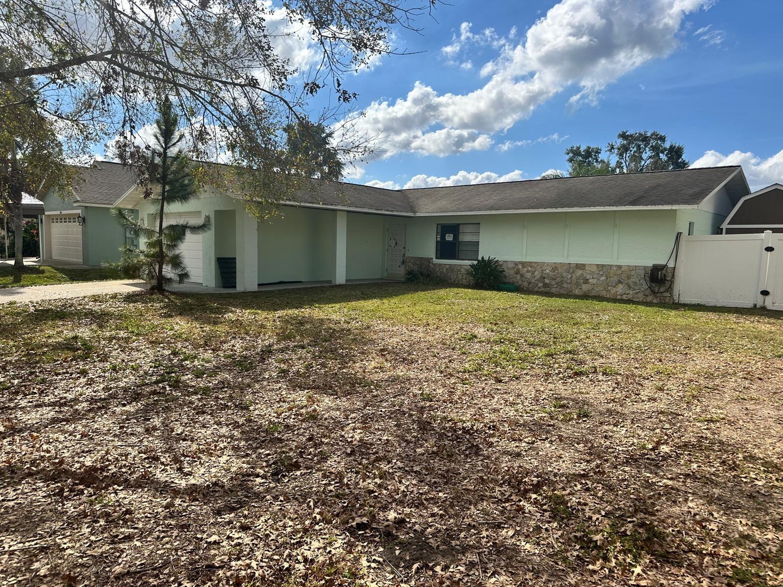 Welcome to the serenity of Sylvan Shores in picturesque Lake Placid, FL. This home is situated towards the end of a cul de sac on a spacious lot with plenty of shady trees. Bring your boat and your fishing pole as it is ALSO located on a freshwater canal that takes you to Lake Clay. Looking for the perfect first-time home, seasonal home, or vacation rental? This home will check all of those boxes and MORE. Check out the spacious split Floor plan, NO carpet, updated Flooring & guest bathroom, enclosed Lanai and Outdoor Storage Shed. Being sold As-Is with right to inspect.
