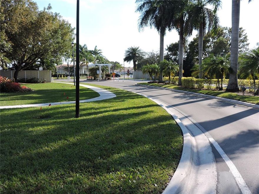 SPACIOUS 2 BEDROOM 1 1/2 BATH TOWNHOUSE LOCATED IN GATED COMMUNITY, SCREENED PATIO WITH BEAUTIFUL VIEW OF LAKE, CORNER UNIT, HURRICANE SHUTTERS, COMMUNITY POOL AND TOT LOT, CLOSE TO SHOPPING AND EASY ACCESS TO HIGHWAYS