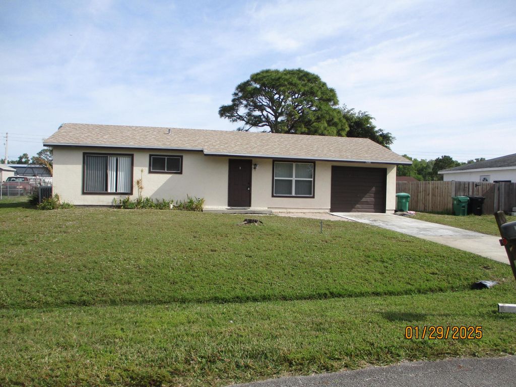 Photo of 261 SW Homeland Road, Port Saint Lucie, FL 34953 (MLS # R10984714)