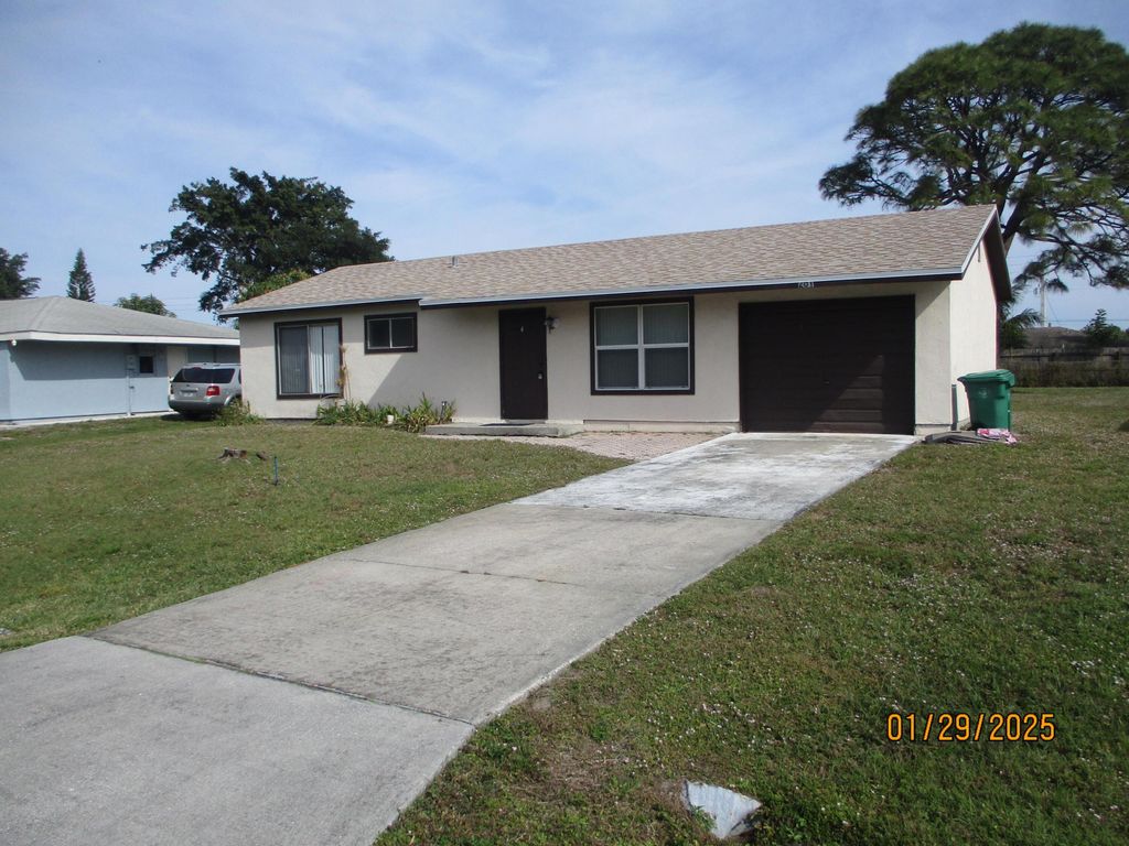 Photo of 261 SW Homeland Road, Port Saint Lucie, FL 34953 (MLS # R10984714)