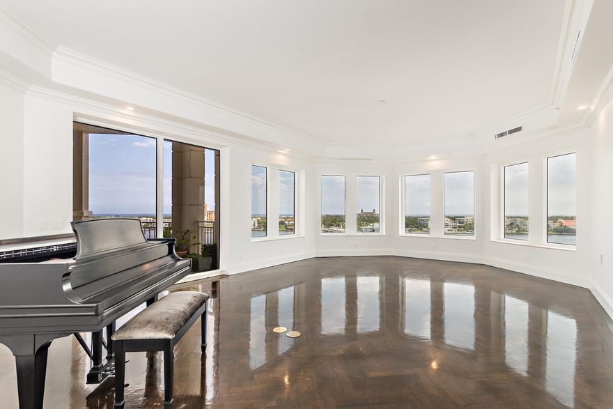 Welcome to the largest condo with the best views in One Watermark Place on the market. With panoramic Ocean and Intracoastal views, this coveted southeast corner condo features over 5,500 sq. ft. and four sunset/sunrise balconies. Private elevator leads into an exquisite, spacious and flexible floor plan. 4-BD and 5.5-BA; Chef's kitchen, butler's pantry, large master suite, office and family room. Guest or au pair quarters within the condo. The exclusive One Watermark Place offers intimate luxury with 48 residences, full service concierge, security, valet, waterfront pool, movie theater, pet run, exquisite social and fitness rooms. You'll feel as if you're at a Ritz Carlton with five -star service. Two parking spaces, storage space. Slips available for lease for up to a 100' yacht