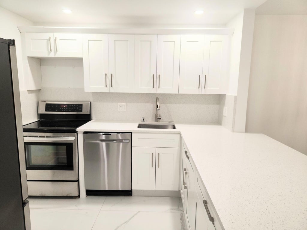Photo of 14790 BONAIRE Boulevard #202, Delray Beach, FL 33446 (MLS # B26089641)