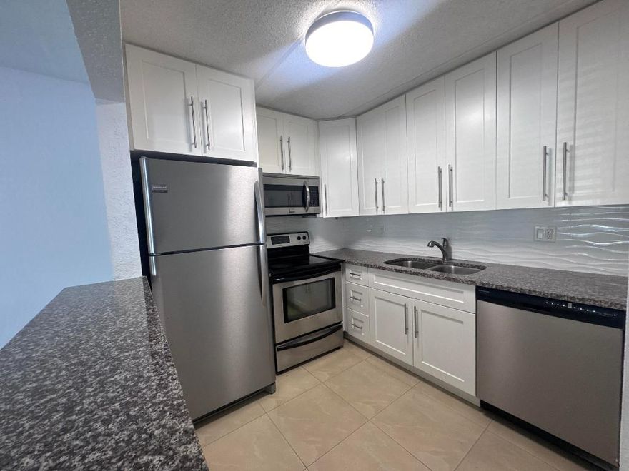 Discover this charming condo located in Palm Springs, FL 33461. The home features stainless-steel appliances and in-unit laundry for added comfort and convenience. Enjoy a bright living space with a functional layout perfect for everyday living. The community offers great amenities, including a refreshing pool and a clubhouse ideal for gatherings, parties, and relaxing weekends for everyone. A wonderful option for anyone seeking comfort, a great location, and a welcoming lifestyle