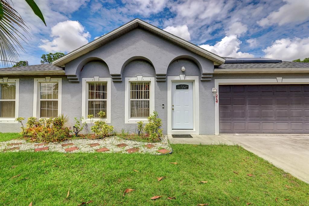 Photo of 3674 SW Zullo Street St, Port Saint Lucie, FL 34953 (MLS # R10828108)