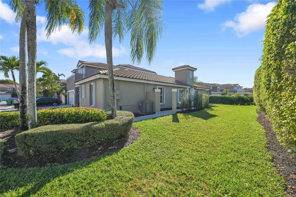 Photo of 11766 NW 57th Street, Coral Springs, FL 33076 (MLS # F10530100)