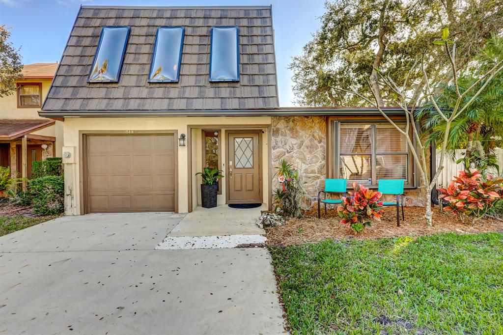 Photo of 1048 Raintree Drive, Palm Beach Gardens, FL 33410 (MLS # R10864861)