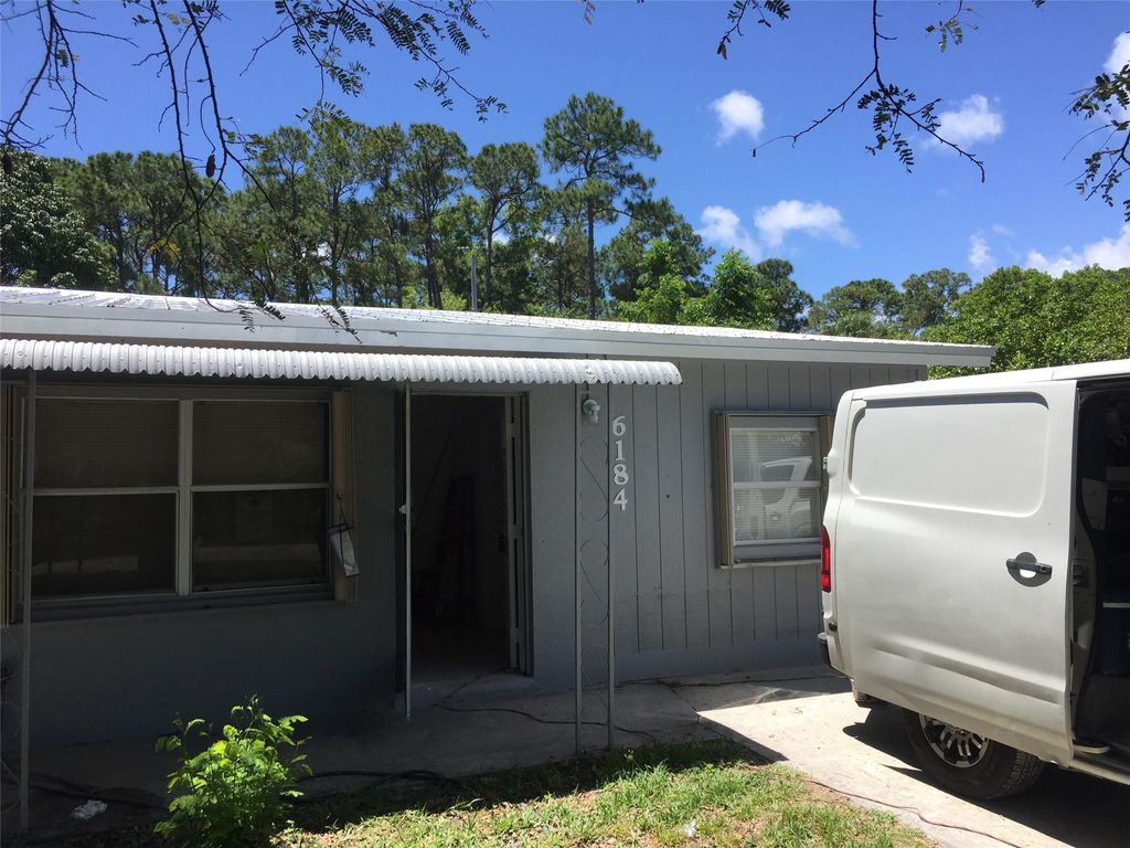 Photo of 6184 SE Orange Blossom Trail, Hobe Sound, FL 33455 (MLS # F10443356)