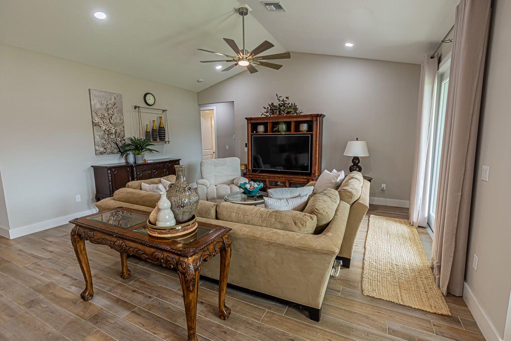 Photo of 4037 SW Mcintosh Street, Port Saint Lucie, FL 34953 (MLS # B26013805)