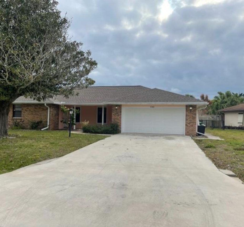 Photo of 5310 Paleo Pines Circle, Fort Pierce, FL 34951 (MLS # R10775490)
