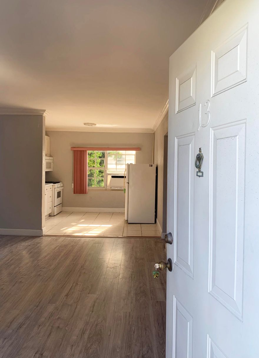 Spacious 1 Bed + 1 Bath, in a charming small building 1 block from Calle 8. New refrigerator. New AC. New flooring. Walk-in closet. Washer/ Dryer on premises. Max occupancy family of 3. Easy street parking.