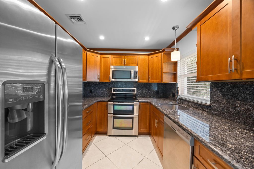 Photo of 1614 NE 11th Avenue, Fort Lauderdale, FL 33305 (MLS # F10524639)