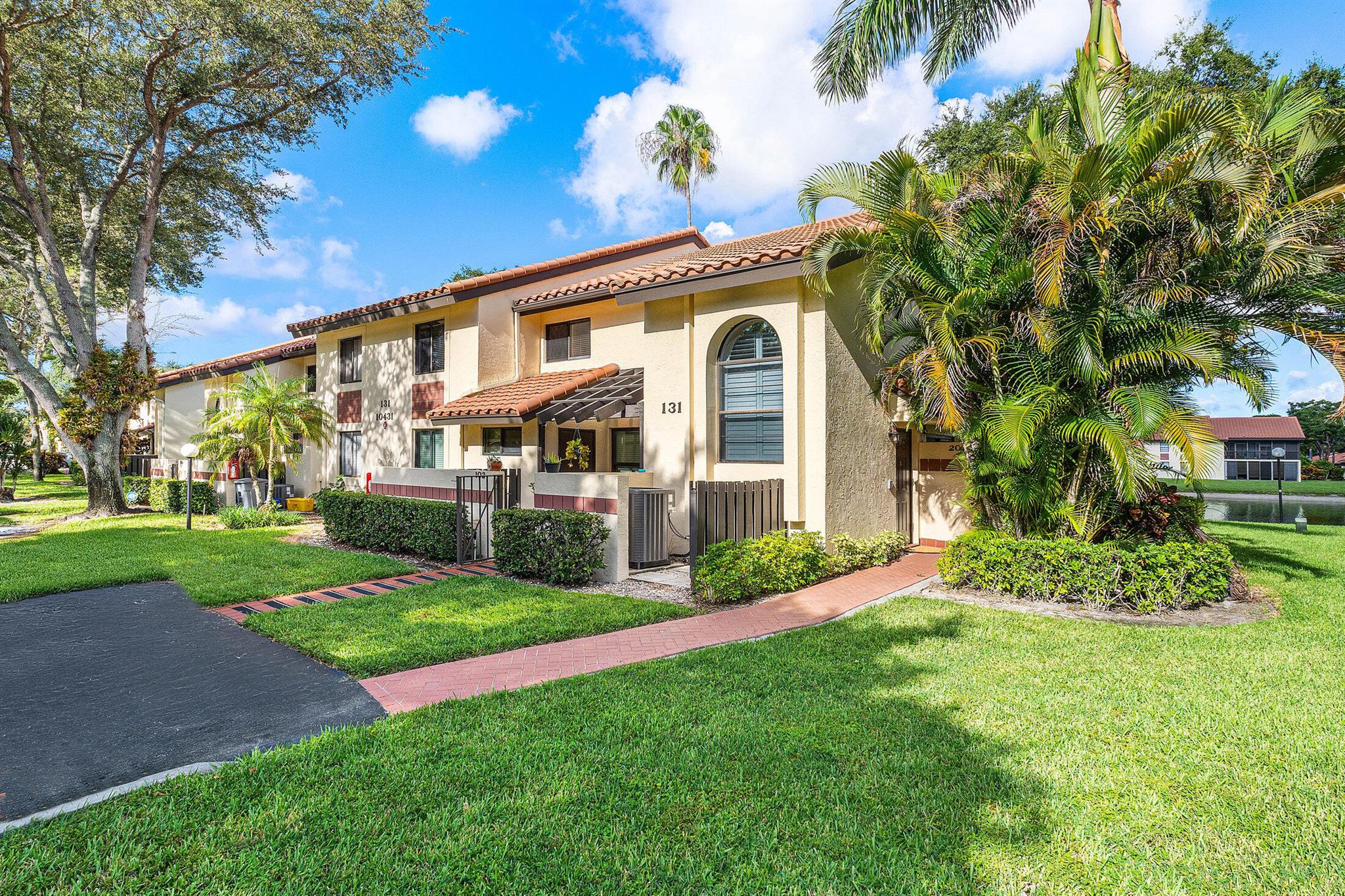 Unique opportunity to own a REMODELED, 3/2 CORNER UNIT in desirable 55+ Palm Chase Lakes. Steps to amenities and a SHORT walk to worship makes this the best on the market! Top-to-bottom remodel in 2019 and ready for you to just enjoy. Light, bright and open is what you immediately feel with the soaring ceilings (no popcorn!) and premium LAKE VIEW. Windows on 3 sides add to the spacious feeling. NEW Kitchen is re-designed with modern luxury & convenience in mind. Custom solid wood cabinetry, glass mosaic backsplash and granite counter tops make a statement.