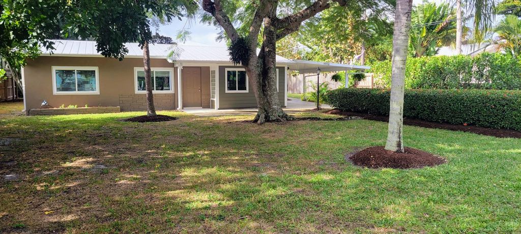 Photo of 5002 SE Capstan Avenue, Stuart, FL 34997 (MLS # R10941180)