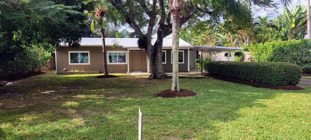 Photo of 5002 SE Capstan Avenue, Stuart, FL 34997 (MLS # R10941180)