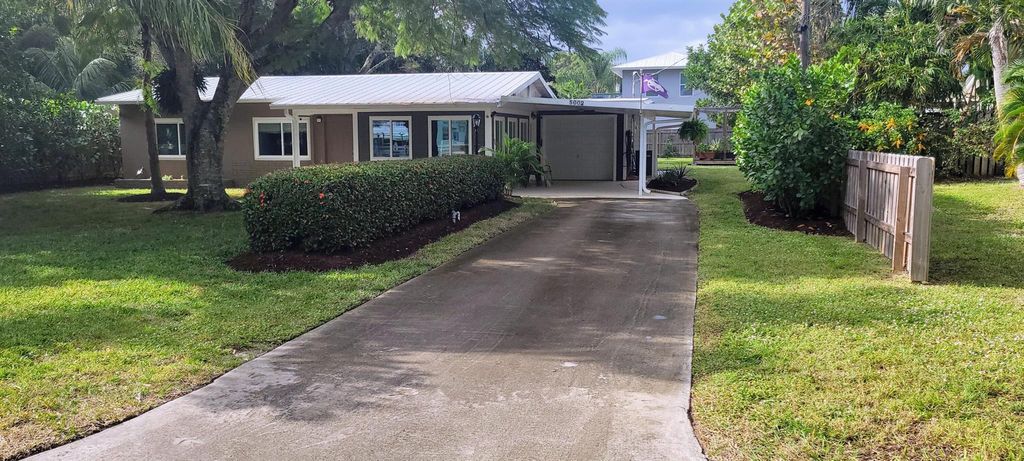 Photo of 5002 SE Capstan Avenue, Stuart, FL 34997 (MLS # R10941180)